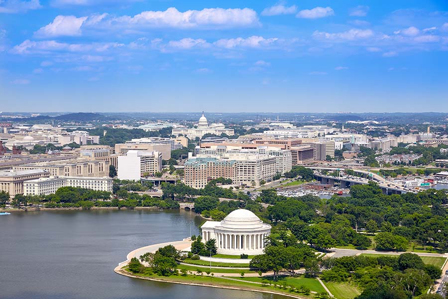 Contact - Aerial View Of Washington DC Against Blue Sky